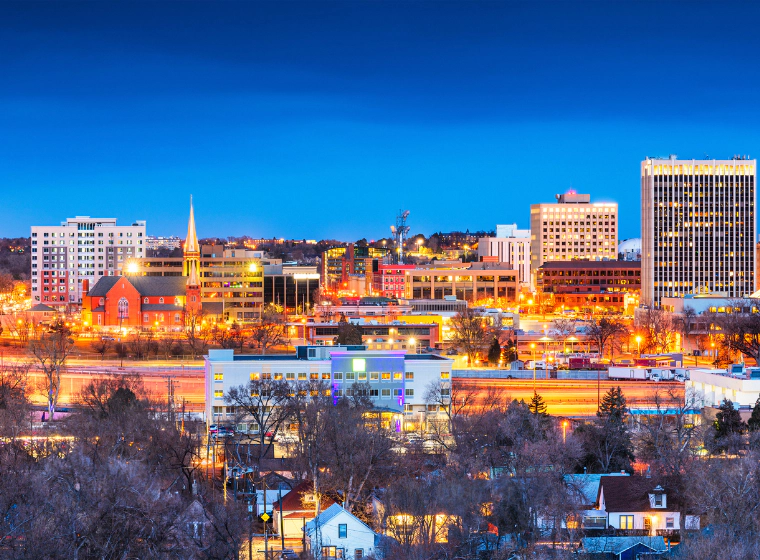 a view of colorado springs at night